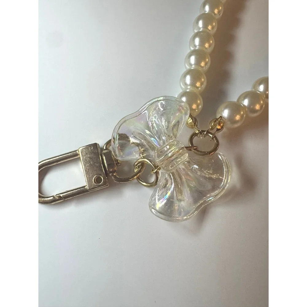Faux Pearl Wristlet Keychain with Iridescent Bow Charm Gold‎ Tone Hardware Cream